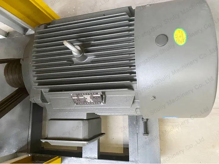 motor: provides power to drive the screw press